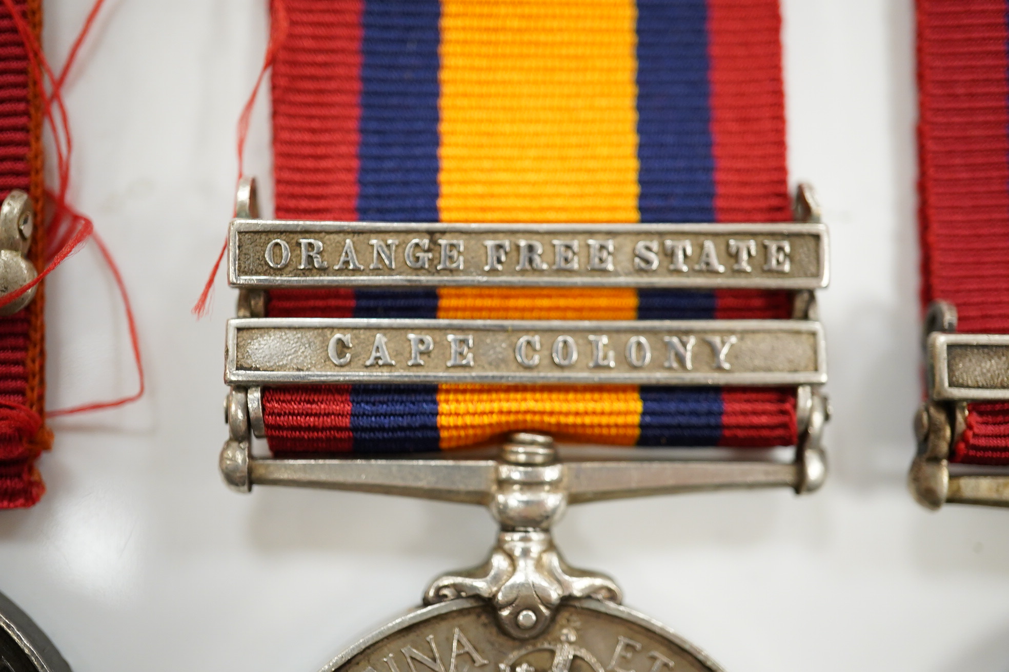 Queens South Africa Medal with CC clasp to 4493 Pte J.Finan, W.York:Regt, another with OFS and CC clasps to 3414 Pte E.Barnett, RL Fus and a third with detached disc to Sapr G Streeter, R.E.